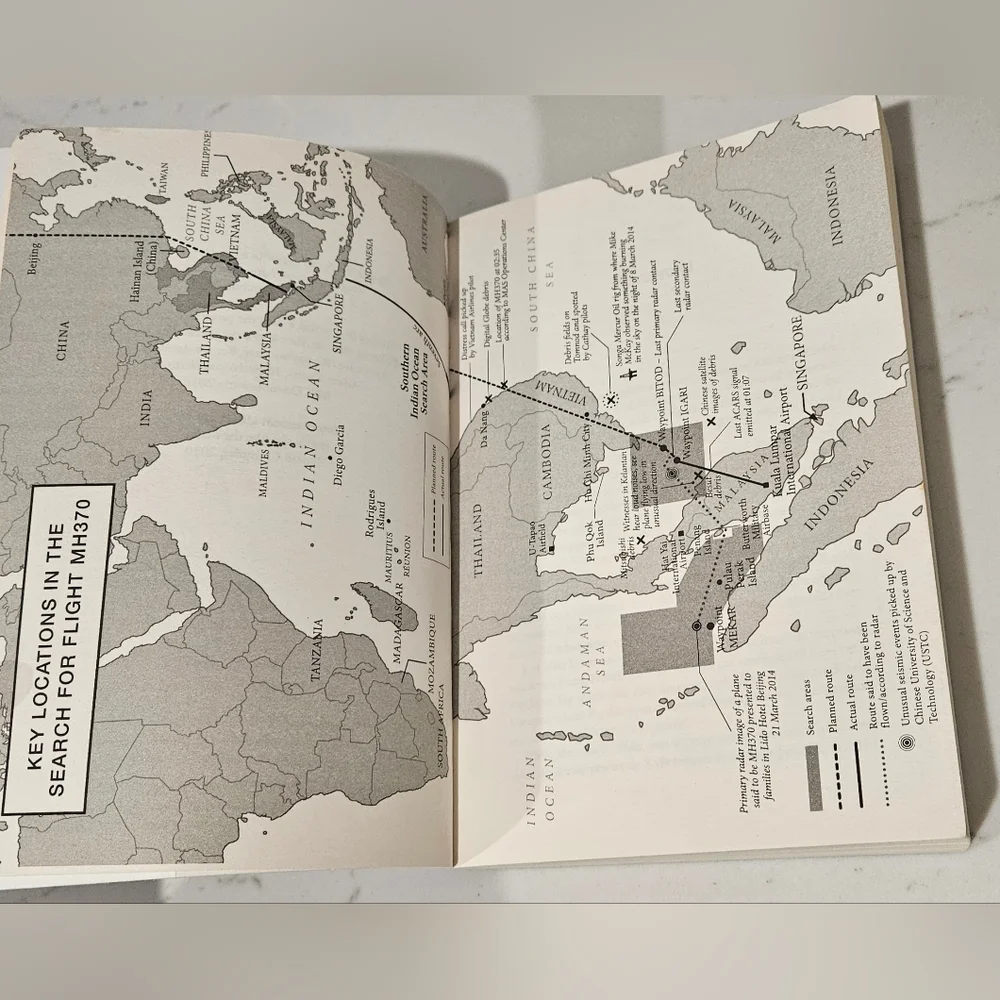 BOGO The Disappearing Act: The Impossible Case of MH370 Paperback Book